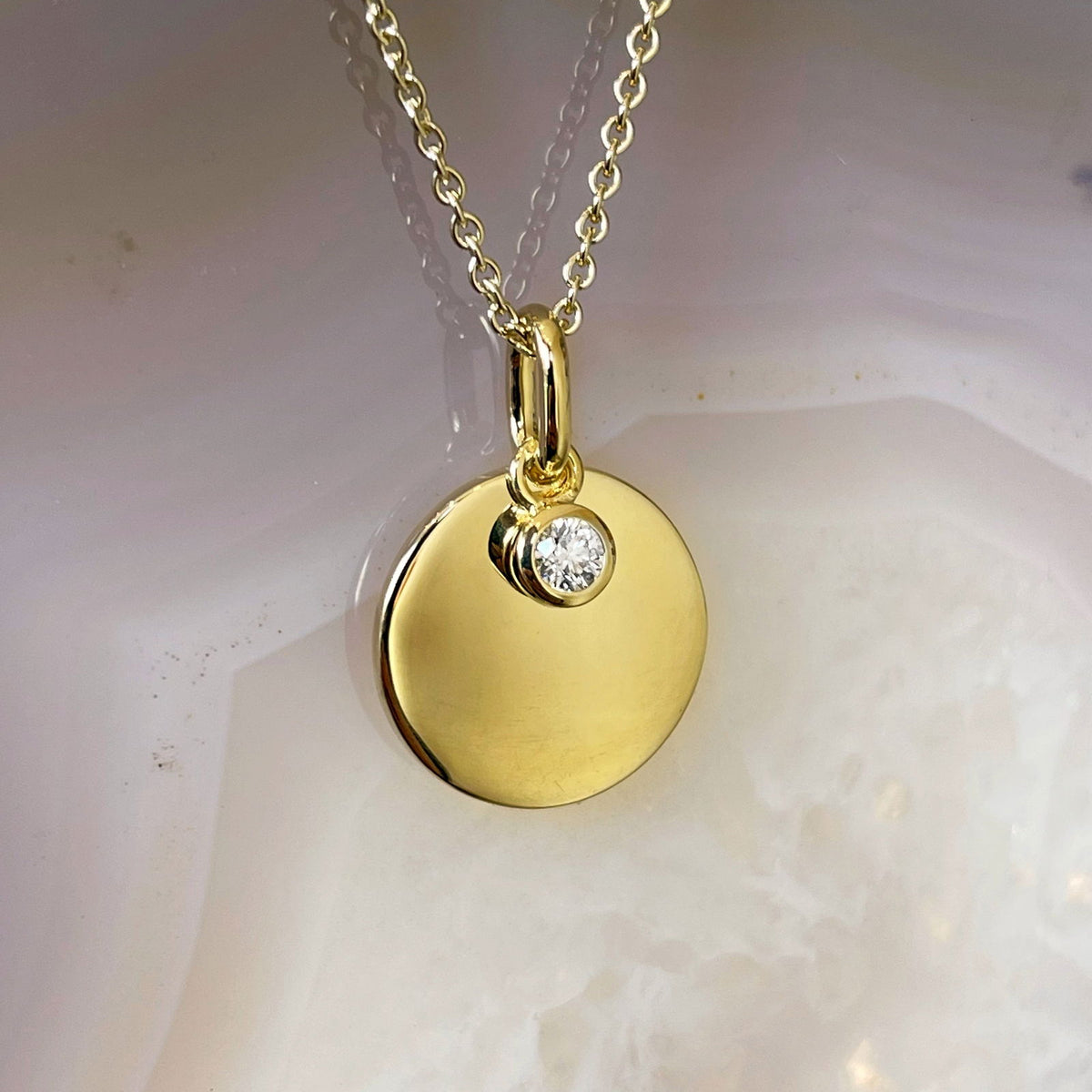 9ct Diamond disc pendant 9ct Diamond disc pendant