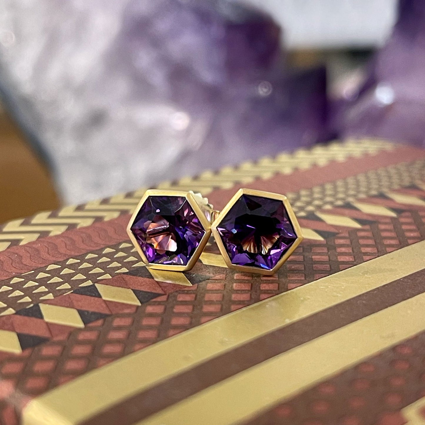 Photo of Amethyst Studs in a decorative scene, designed by , available at Plumb Gold & Plumb Silver