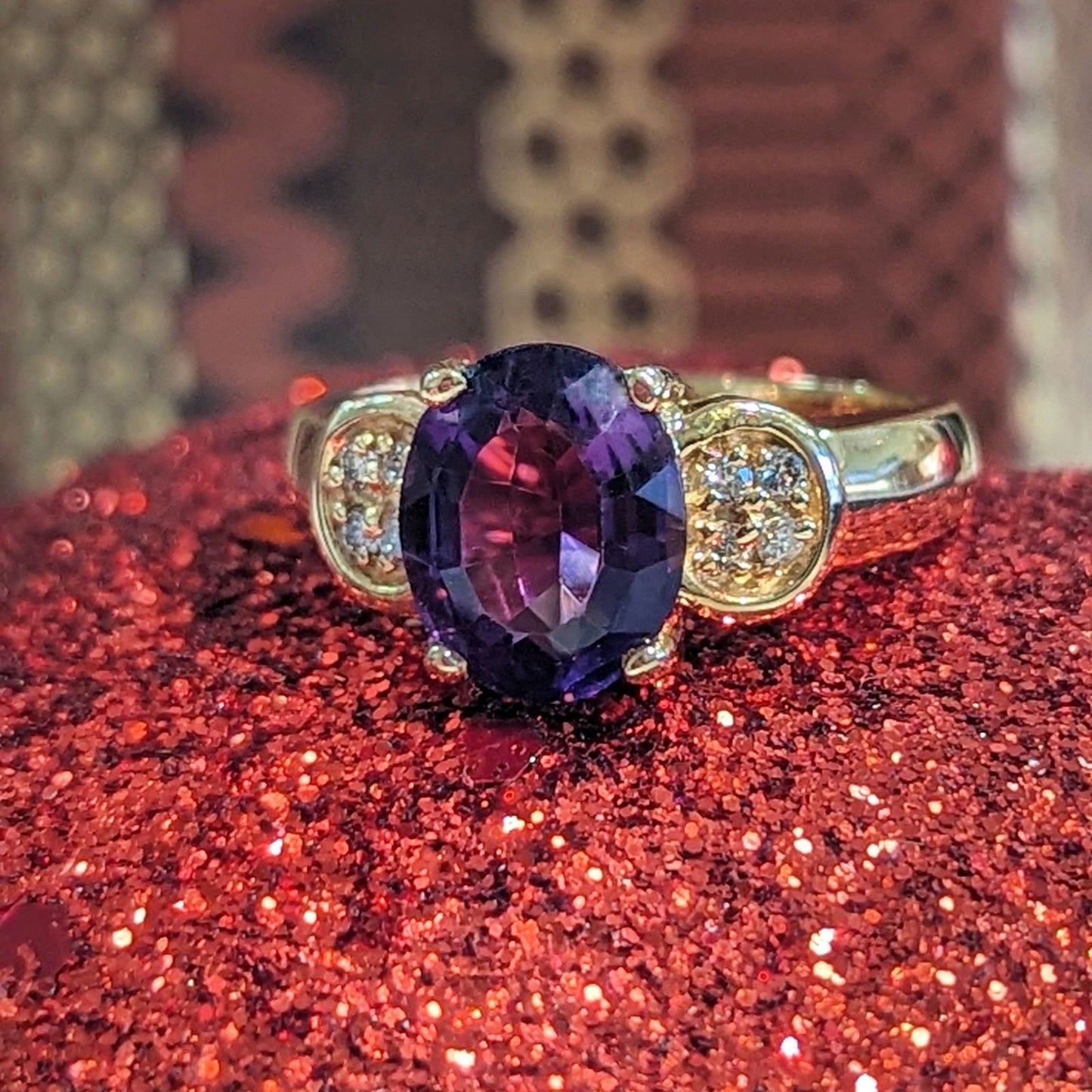 Photo of Amethyst and Diamond Ring in a decorative scene, designed by , available at Plumb Gold & Plumb Silver