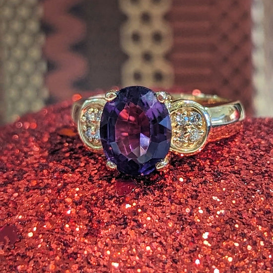 Photo of Amethyst and Diamond Ring in a decorative scene, designed by , available at Plumb Gold & Plumb Silver