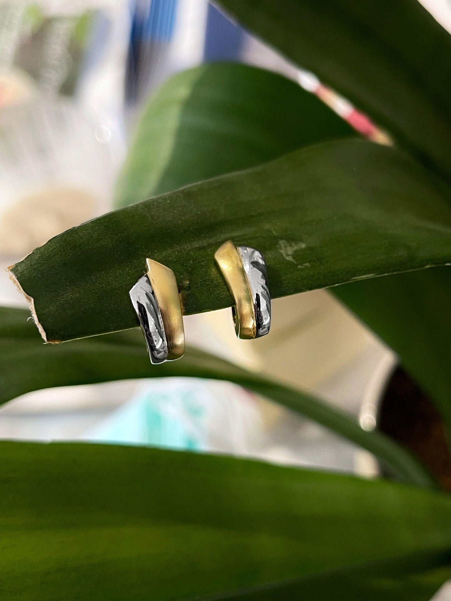 Photo of Angled Huggies in a decorative scene, designed by , available at Plumb Gold & Plumb Silver