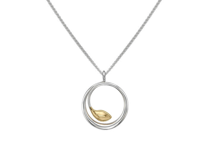 Photo of "Be-Leaf" Necklace in a decorative scene, designed by , available at Plumb Gold & Plumb Silver
