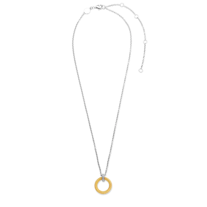 Photo of Beaded Circle Necklace in a decorative scene, designed by , available at Plumb Gold & Plumb Silver