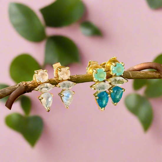 Photo of “Bella” Studs in a decorative scene, designed by -, available at Plumb Gold & Plumb Silver