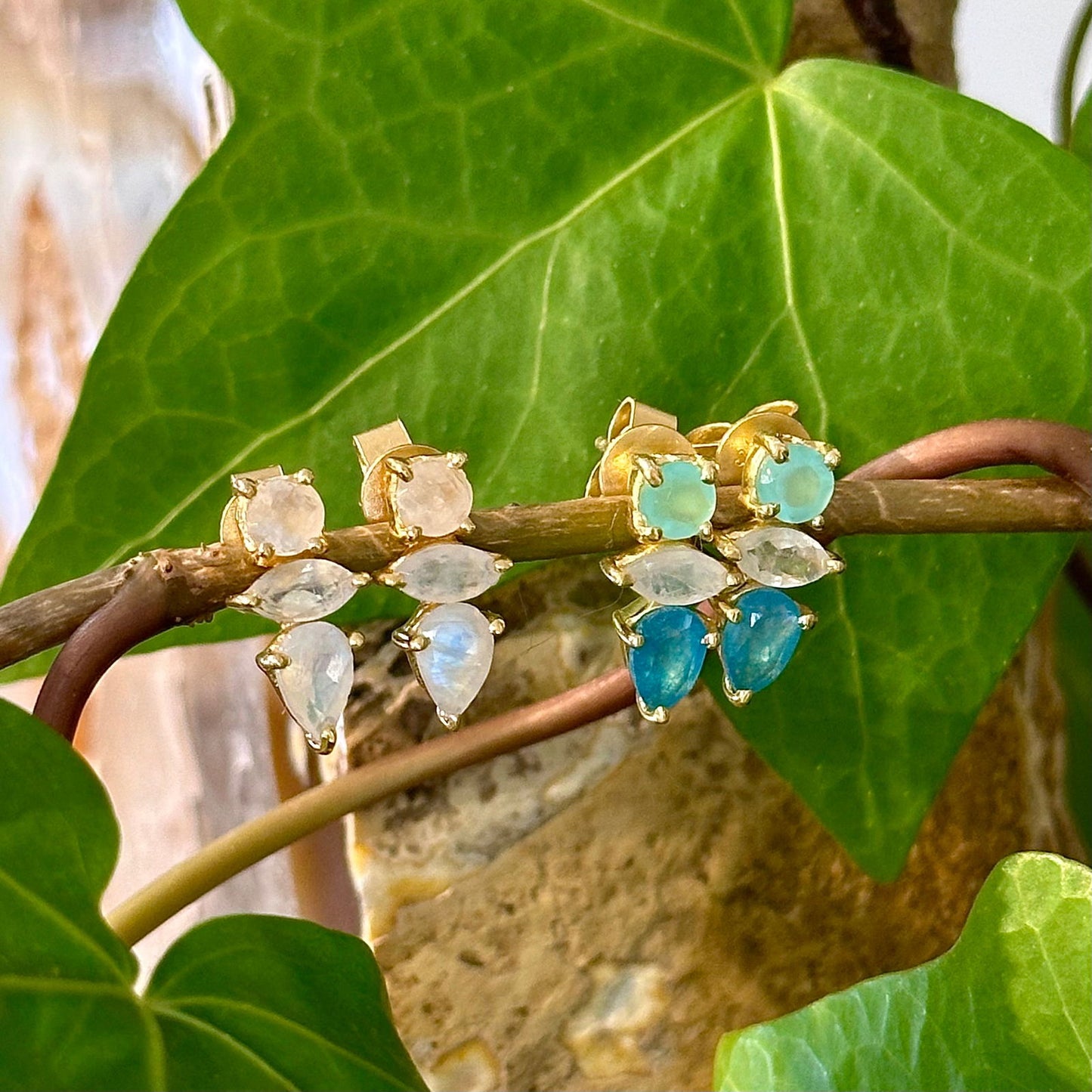 Photo of “Bella” Studs in a decorative scene, designed by -, available at Plumb Gold & Plumb Silver