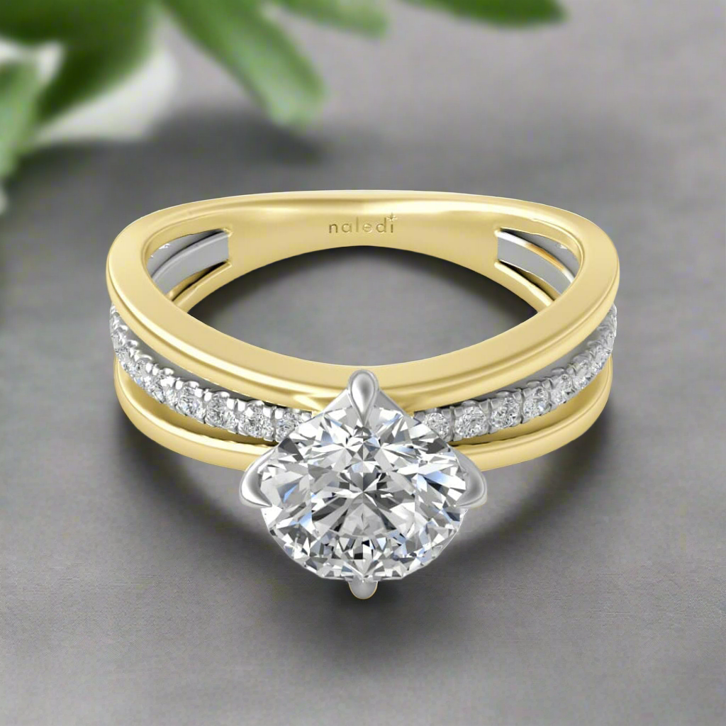 Photo of "Belle" Engagement Mounting in a decorative scene, designed by , available at Plumb Gold & Plumb Silver