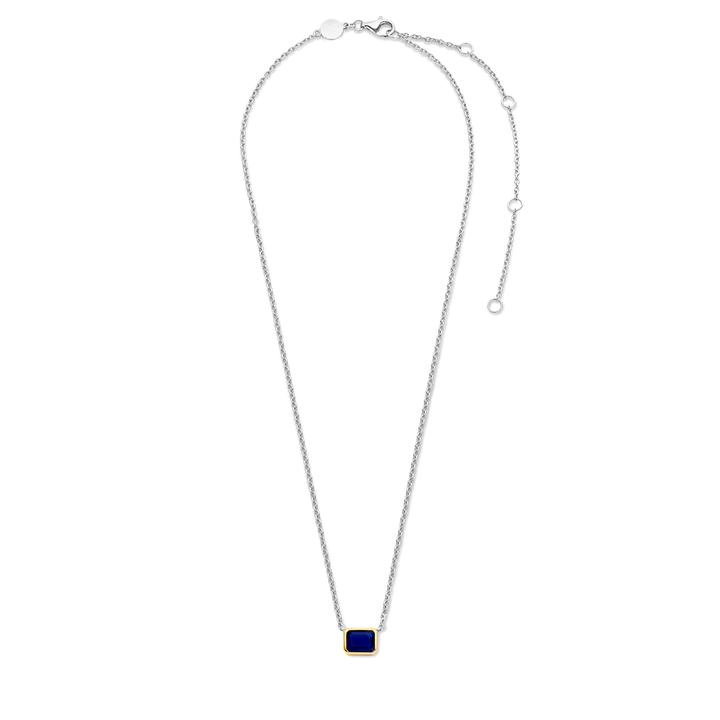 Photo of Blue Cubic Zirconia Necklace in a decorative scene, designed by , available at Plumb Gold & Plumb Silver