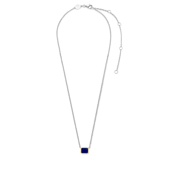 Photo of Blue Cubic Zirconia Necklace in a decorative scene, designed by , available at Plumb Gold & Plumb Silver