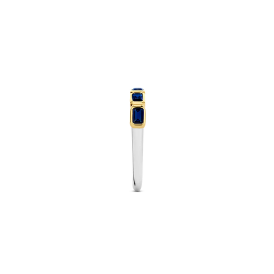 Photo of Blue Emerald-Cut Cubic Zirconia Ring in a decorative scene, designed by , available at Plumb Gold & Plumb Silver