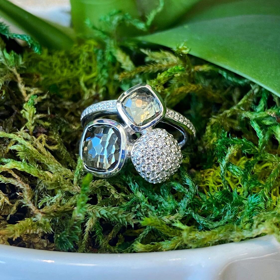 Photo of Blue Quartz and Cubic Zirconia Trio Ring in a decorative scene, designed by , available at Plumb Gold & Plumb Silver