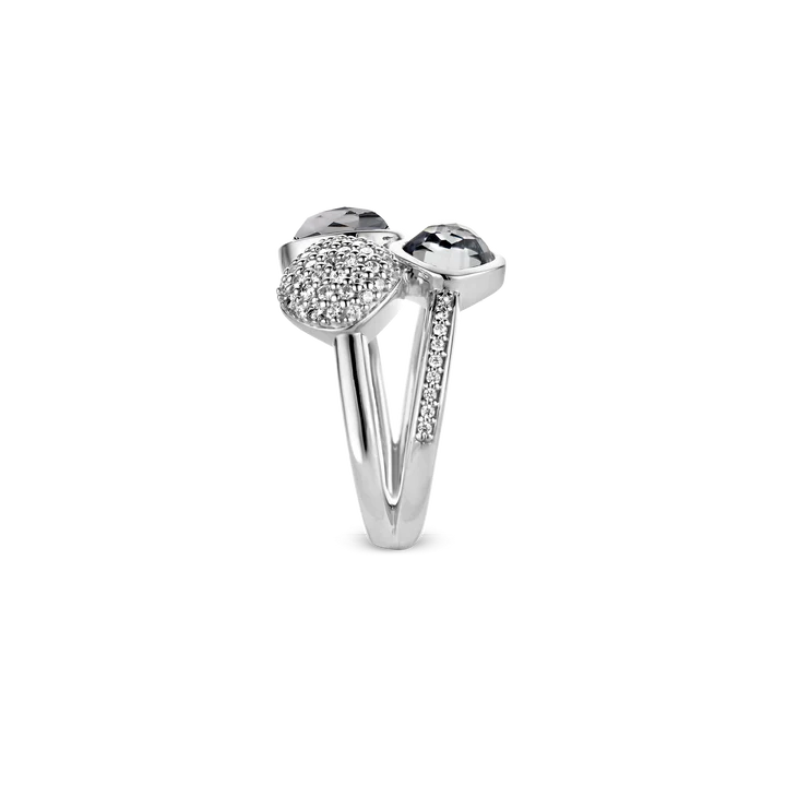 Photo of Blue Quartz and Cubic Zirconia Trio Ring in a decorative scene, designed by , available at Plumb Gold & Plumb Silver