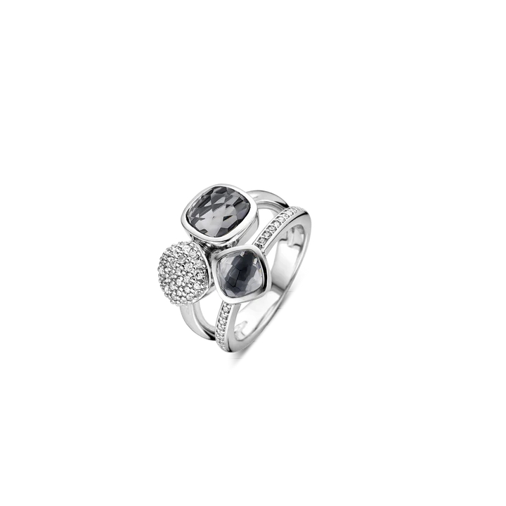 Photo of Blue Quartz and Cubic Zirconia Trio Ring in a decorative scene, designed by , available at Plumb Gold & Plumb Silver
