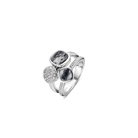 Photo of Blue Quartz and Cubic Zirconia Trio Ring in a decorative scene, designed by , available at Plumb Gold & Plumb Silver