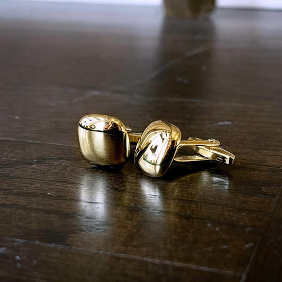 Photo of Breuning Cufflinks in a decorative scene, designed by , available at Plumb Gold & Plumb Silver