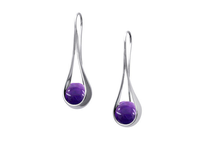Photo of "Captivating" Amethyst Earrings in a decorative scene, available at Plumb Silver jewelry store