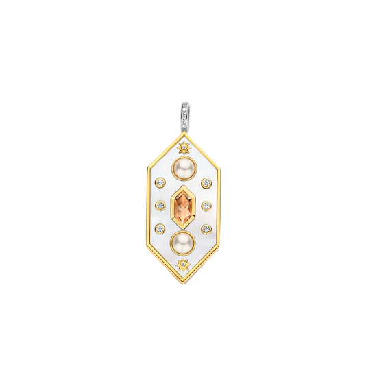 Photo of Celestial Large Hexagon Mother of Pearl Pendant in a decorative scene, designed by , available at Plumb Gold & Plumb Silver