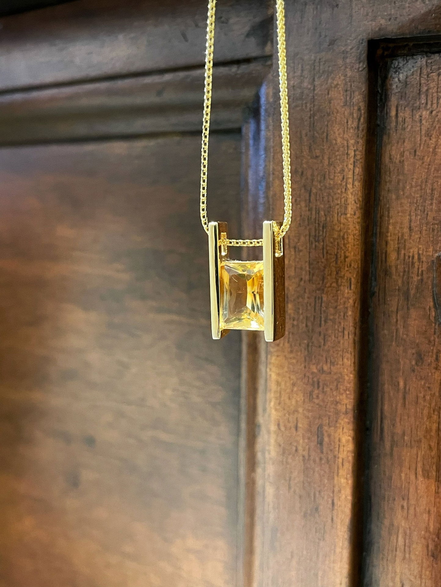 Photo of Citrinada Pendant in a decorative scene, designed by , available at Plumb Gold & Plumb Silver