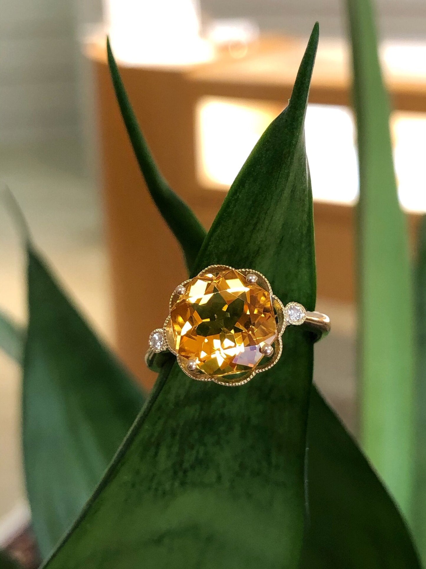 Photo of Citrine Statement Ring in a decorative scene, designed by , available at Plumb Gold & Plumb Silver