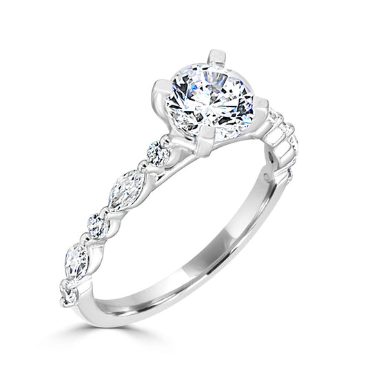 Photo of "Clarice" Solitaire Mounting in a decorative scene, designed by , available at Plumb Gold & Plumb Silver