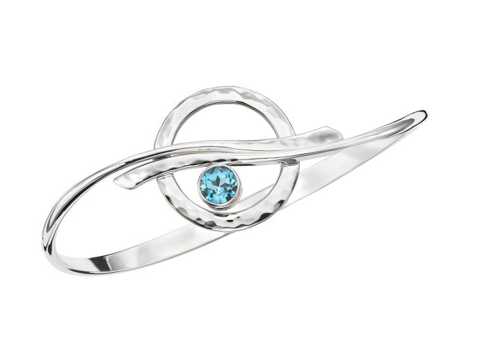 Photo of "Cloudburst" Bracelet in a decorative scene, designed by , available at Plumb Gold & Plumb Silver