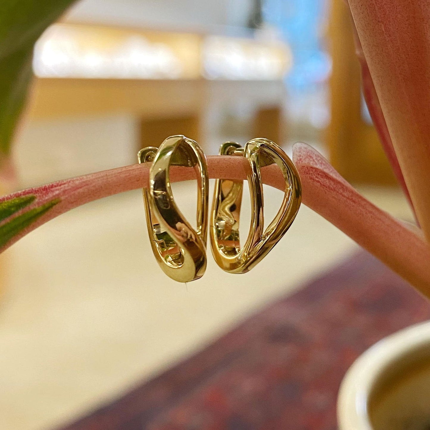 Photo of Club Huggies in a decorative scene, designed by , available at Plumb Gold & Plumb Silver