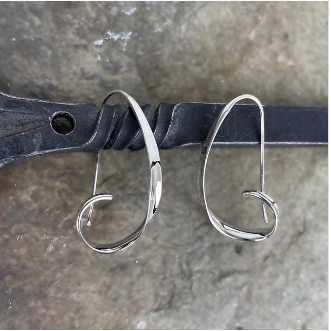 Photo of "Coastal" Earrings in a decorative scene, designed by , available at Plumb Gold & Plumb Silver