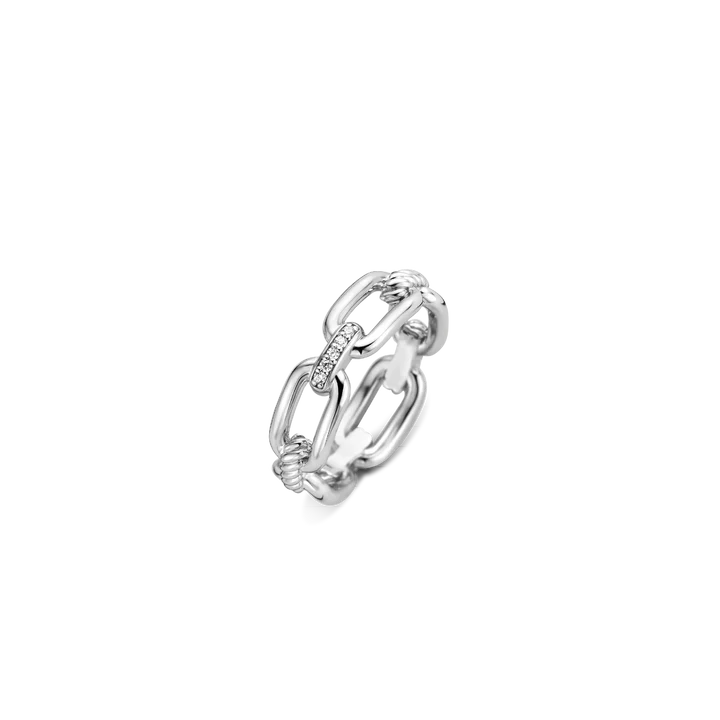 Photo of Cubic Zirconia Chain Link Ring in a decorative scene, designed by , available at Plumb Gold & Plumb Silver