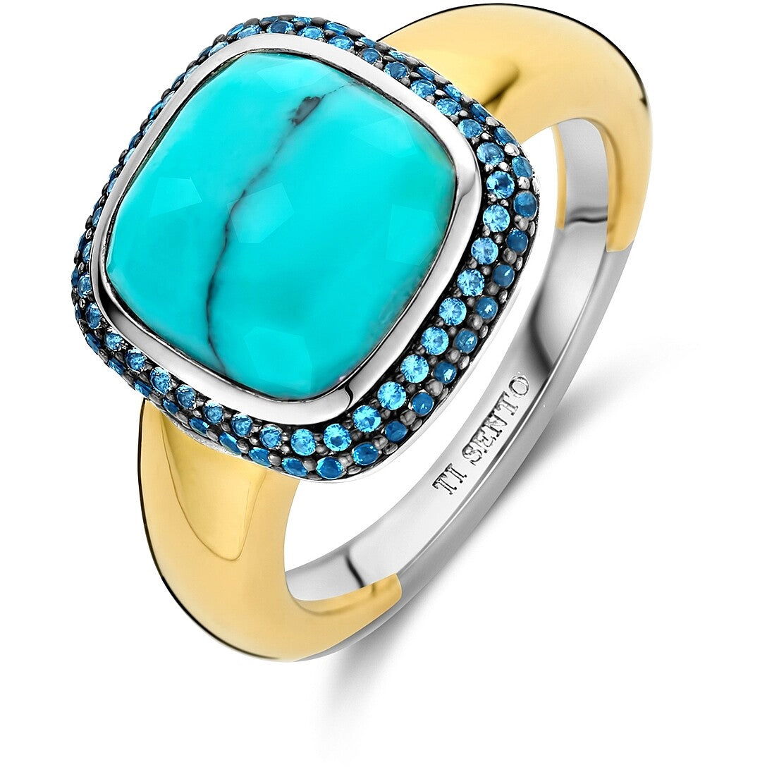 Photo of Cubic Zirconia Halo Bezel Ring in a decorative scene, designed by , available at Plumb Gold & Plumb Silver