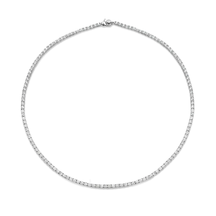 Photo of Cubic Zirconia Tennis Necklace in a decorative scene, designed by , available at Plumb Gold & Plumb Silver