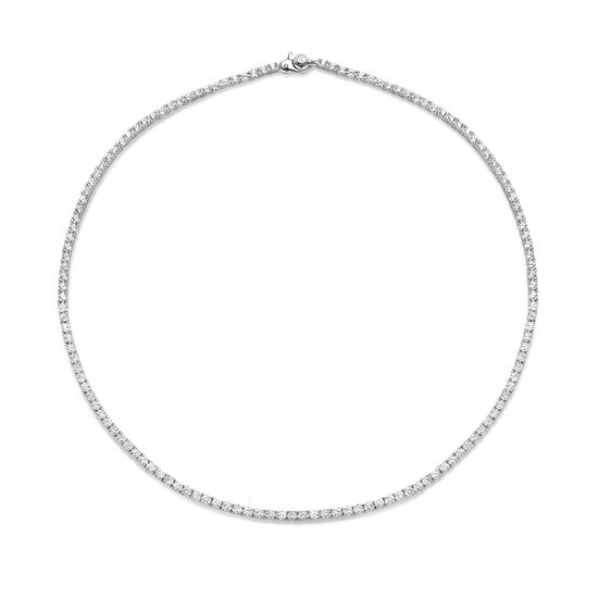 Photo of Cubic Zirconia Tennis Necklace in a decorative scene, designed by , available at Plumb Gold & Plumb Silver