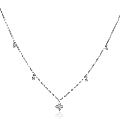 Photo of Dancing Diamond Quatrefoil Necklace in a decorative scene, designed by , available at Plumb Gold & Plumb Silver