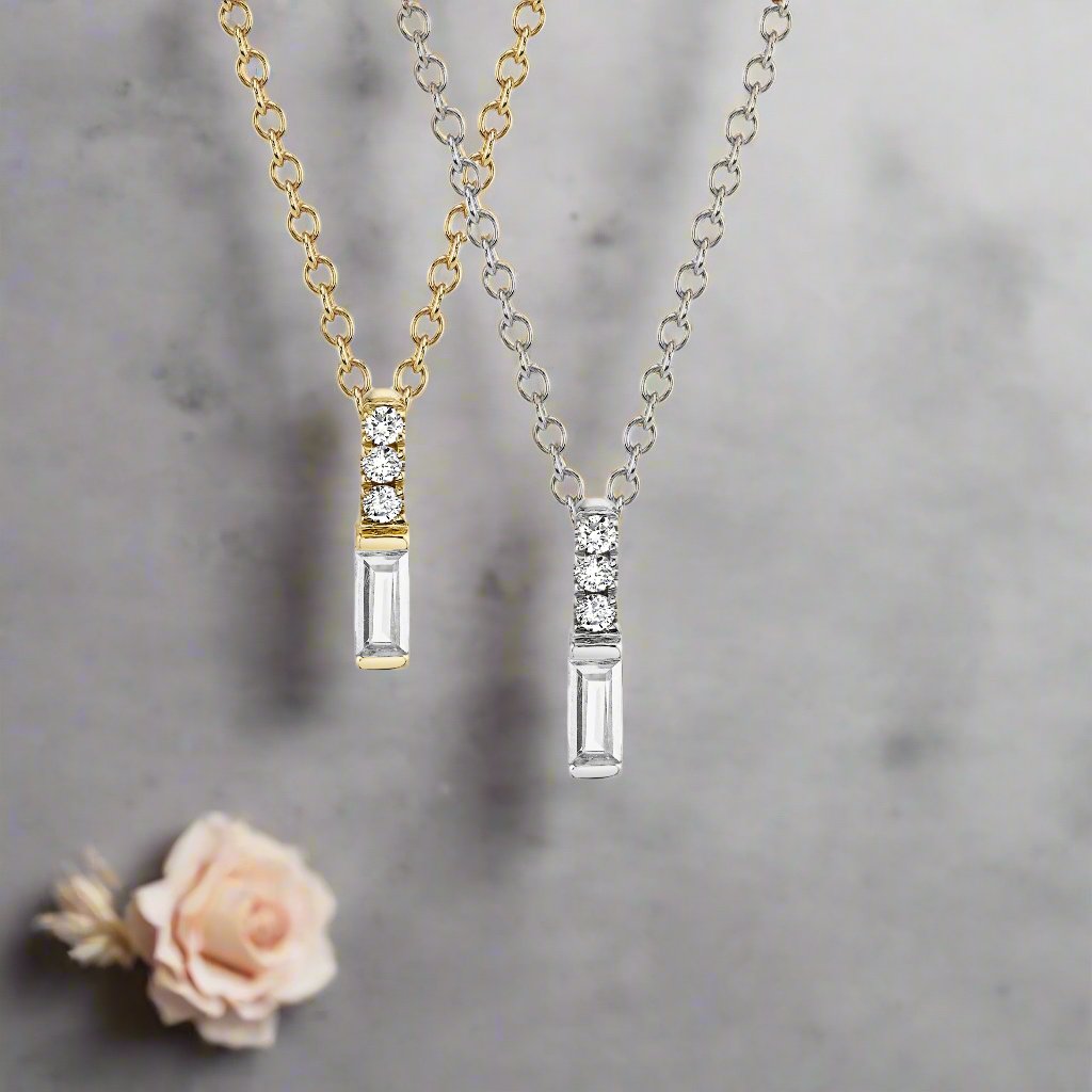 Photo of Diamond Baguette Necklace in a decorative scene, designed by -, available at Plumb Gold & Plumb Silver
