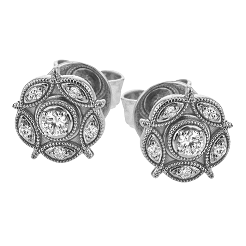 Photo of Diamond Flower Studs in a decorative scene, designed by , available at Plumb Gold & Plumb Silver