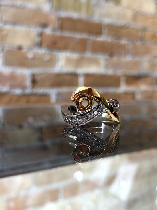 Photo of Diamond Free Form Mounting in a decorative scene, designed by , available at Plumb Gold & Plumb Silver