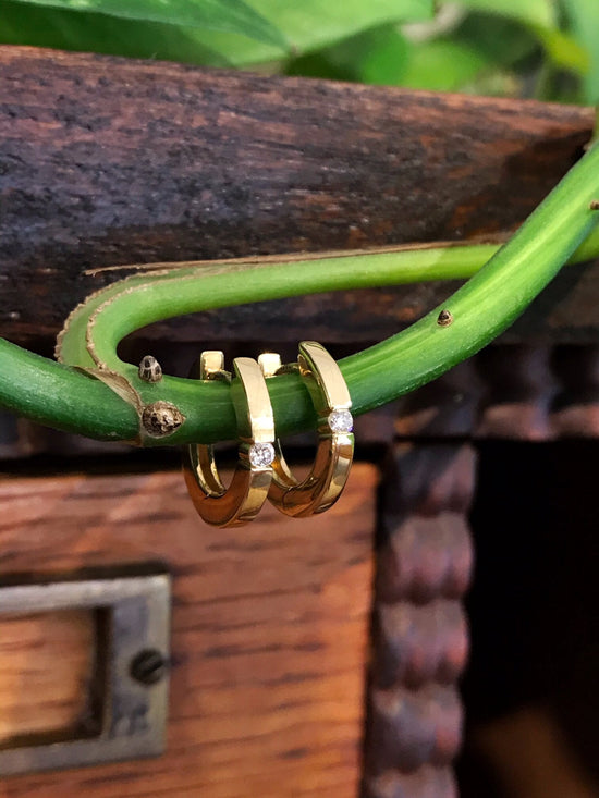 Photo of Diamond Huggies in a decorative scene, designed by , available at Plumb Gold & Plumb Silver