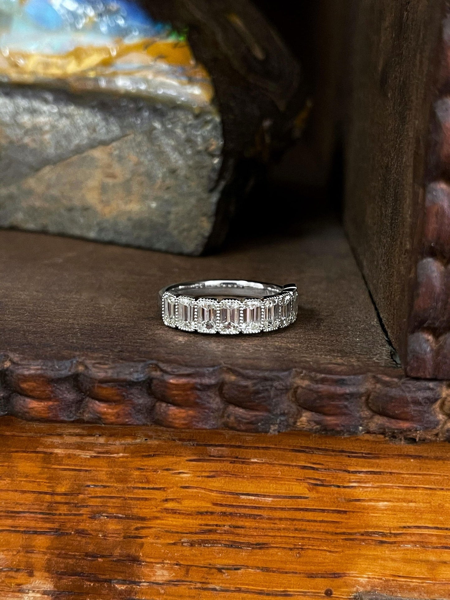 Photo of Diamond & Milgrain Fashion Band in a decorative scene, designed by , available at Plumb Gold & Plumb Silver