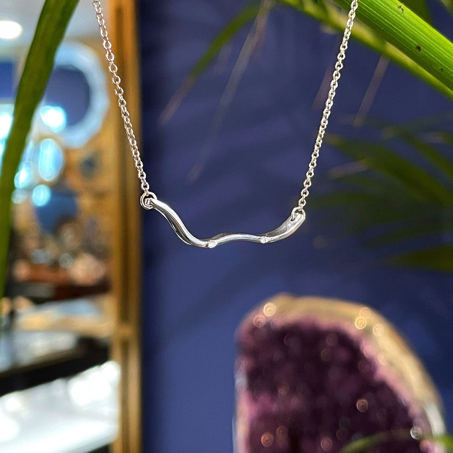 Photo of Diamond Necklace in a decorative scene, designed by , available at Plumb Gold & Plumb Silver