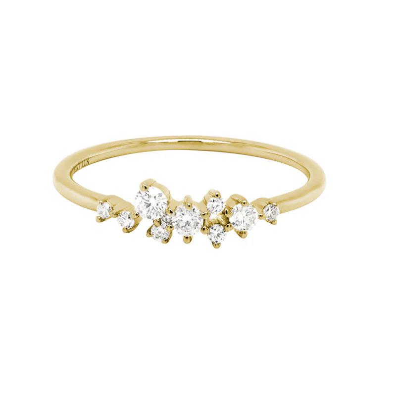 Photo of Diamond Scatter Ring in a decorative scene, designed by , available at Plumb Gold & Plumb Silver