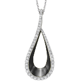 Photo of Diamond Teardrop Necklace in a decorative scene, designed by , available at Plumb Gold & Plumb Silver