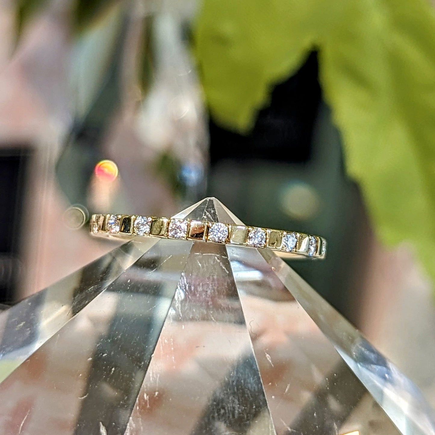 Photo of "Dorothy" Band in a decorative scene, designed by , available at Plumb Gold & Plumb Silver