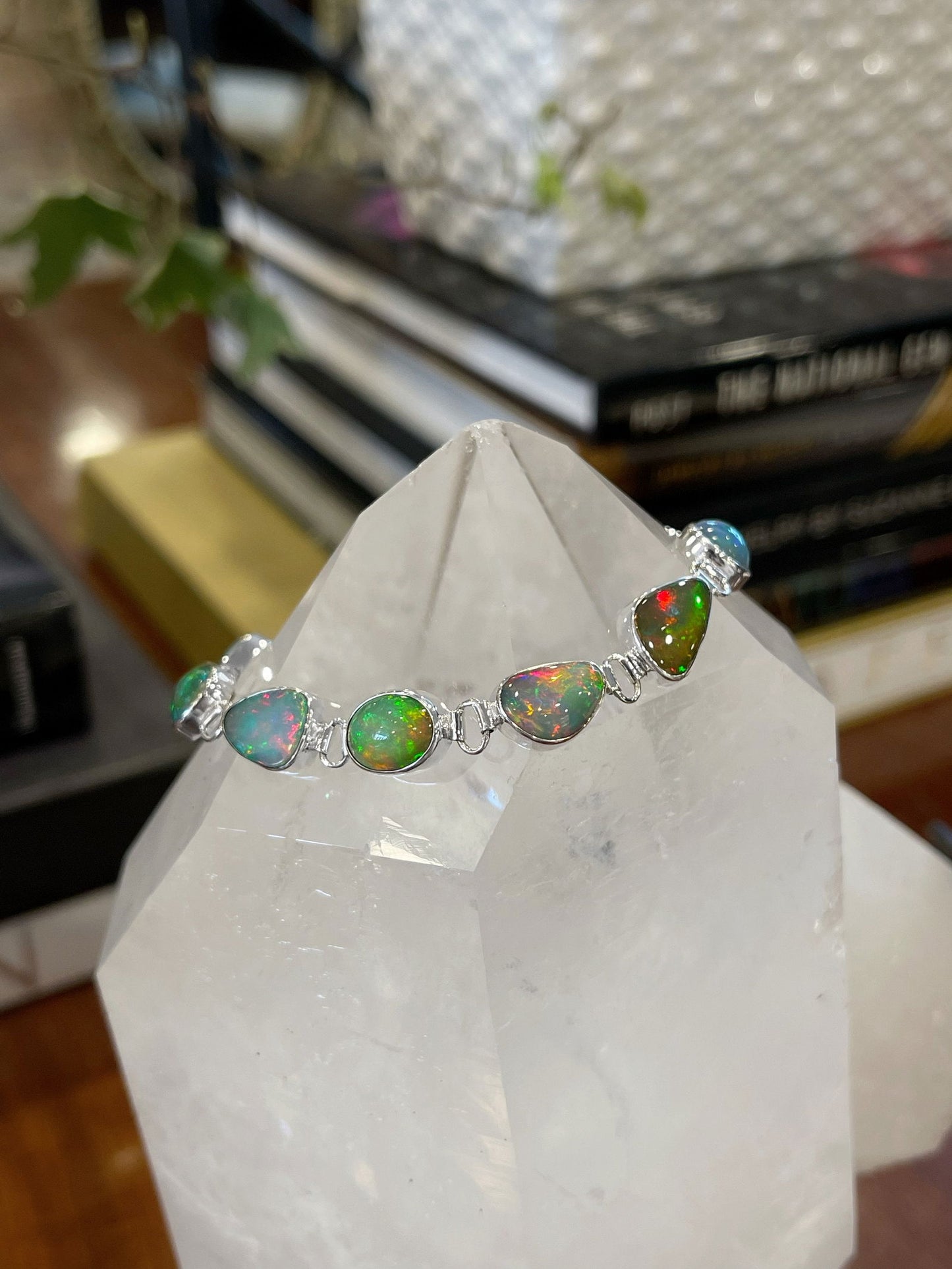 Photo of Dowdy Opal Bracelet in a decorative scene, designed by , available at Plumb Gold & Plumb Silver