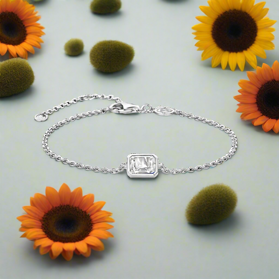 Photo of Emerald Cut Cubic Zirconia Bracelet in a decorative scene, designed by , available at Plumb Gold & Plumb Silver