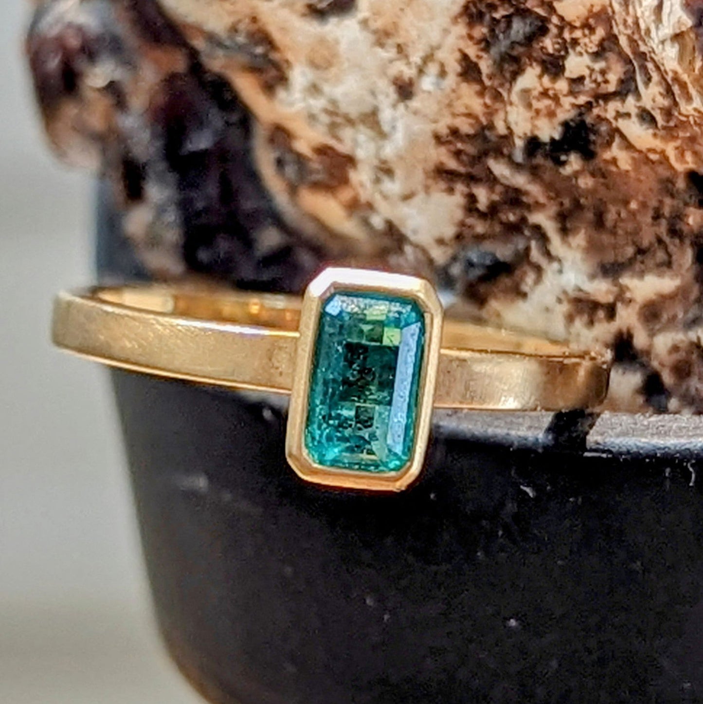Photo of Emerald Yum Drop in a decorative scene, designed by , available at Plumb Gold & Plumb Silver