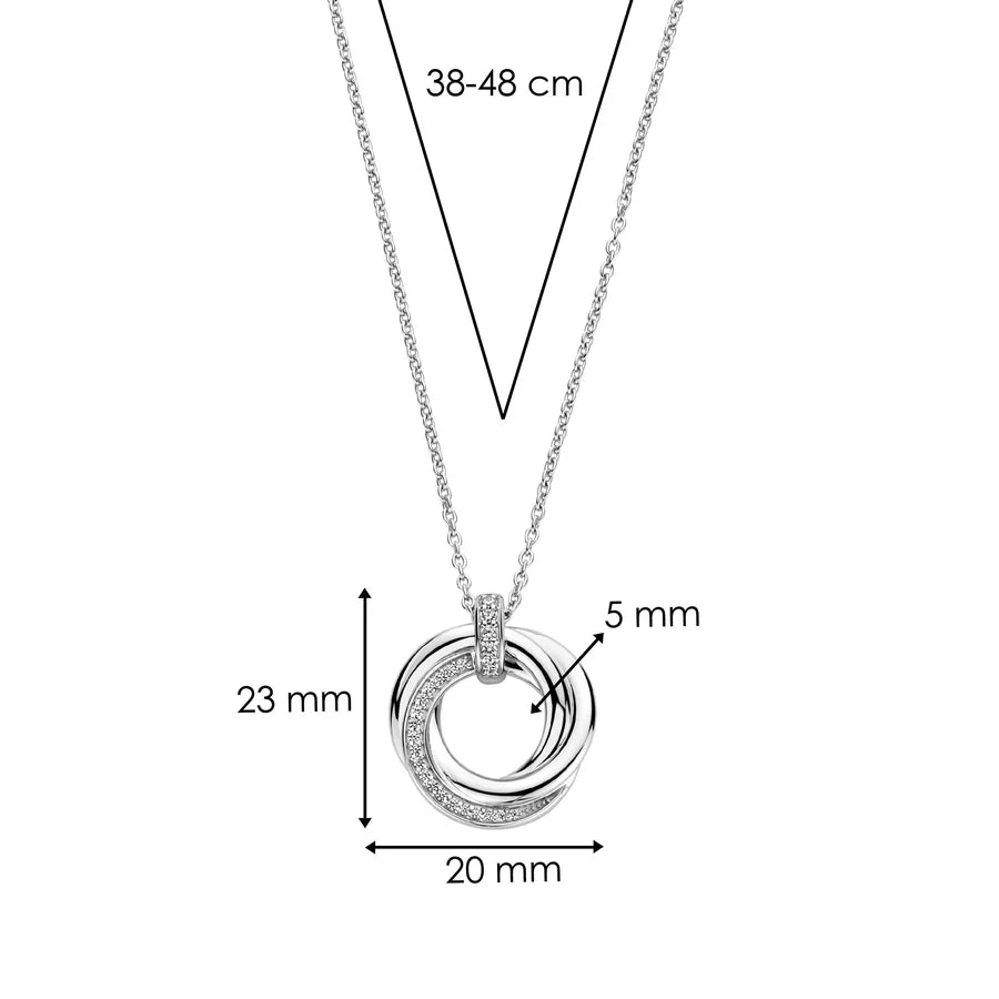 Photo of Entwined Circles Necklace in a decorative scene, designed by -, available at Plumb Gold & Plumb Silver