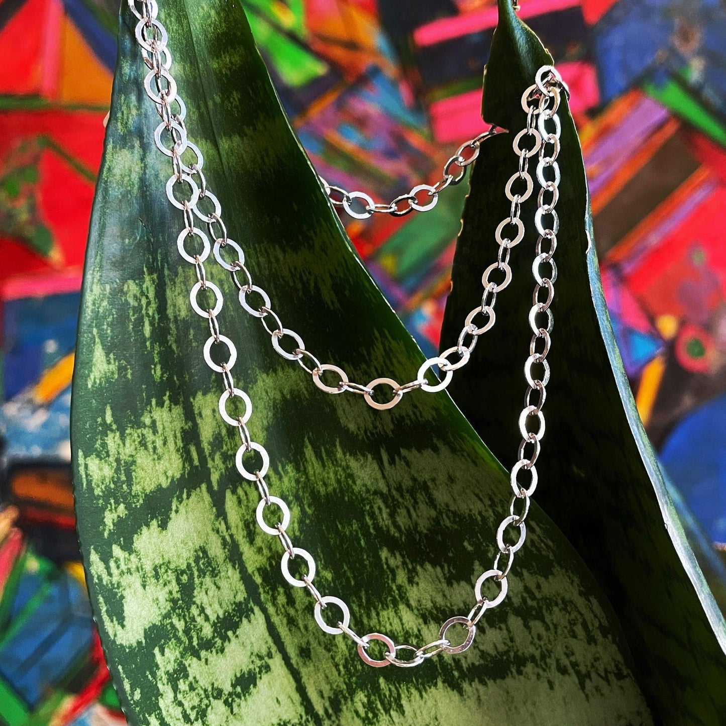 Photo of Fancy Cable Chain in a decorative scene, designed by , available at Plumb Gold & Plumb Silver