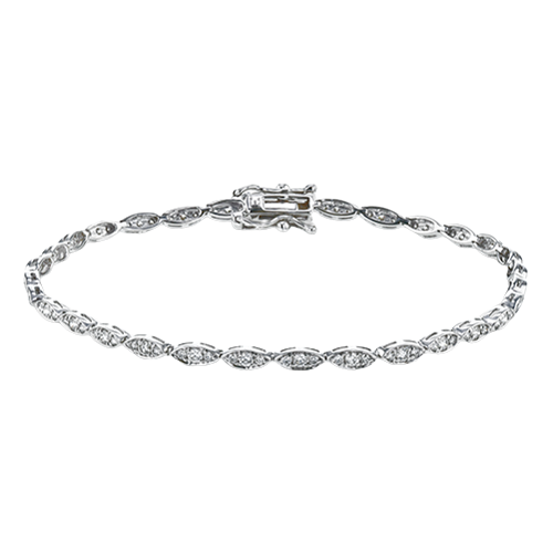 Photo of Fancy Diamond Bracelet in a decorative scene, designed by , available at Plumb Gold & Plumb Silver