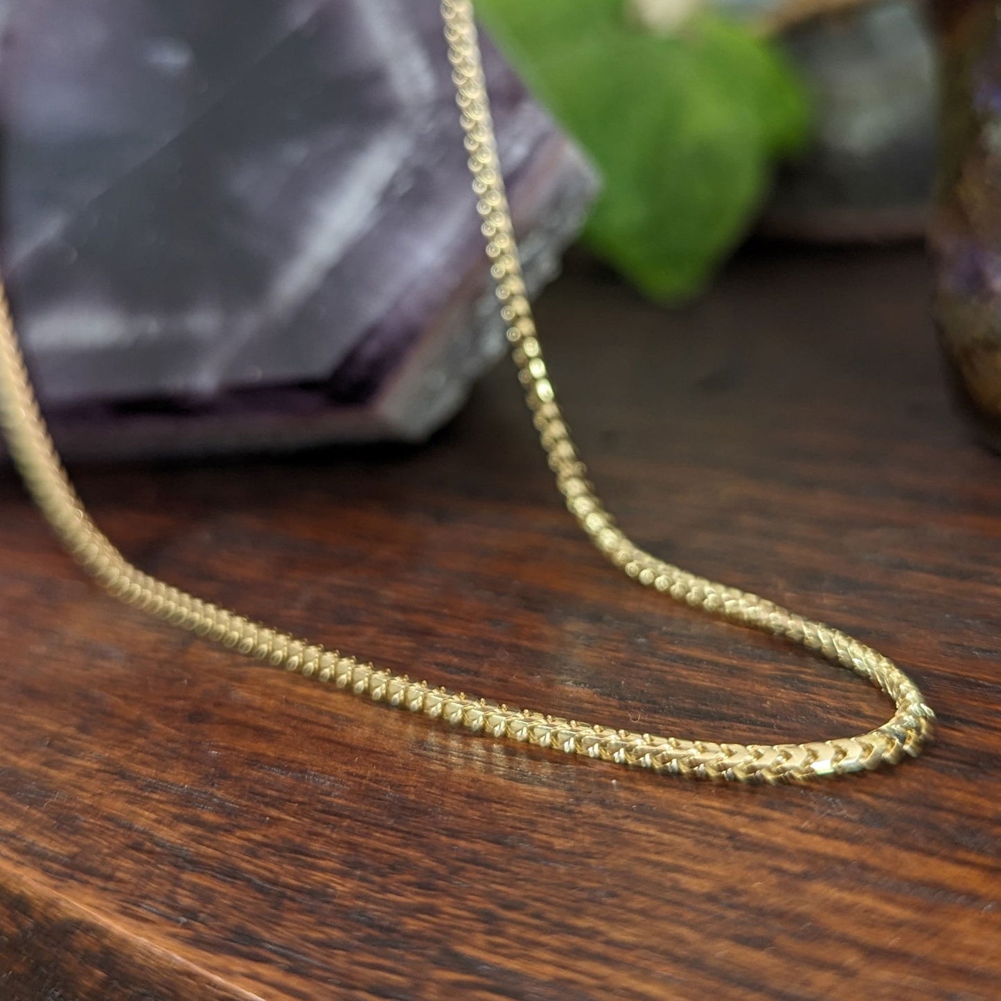 Photo of Franco link Chain in a decorative scene, designed by , available at Plumb Gold & Plumb Silver