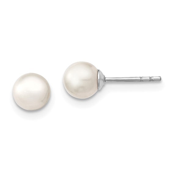 Photo of Freshwater Pearl Stud earrings 5-6mm in a decorative scene, designed by , available at Plumb Gold & Plumb Silver
