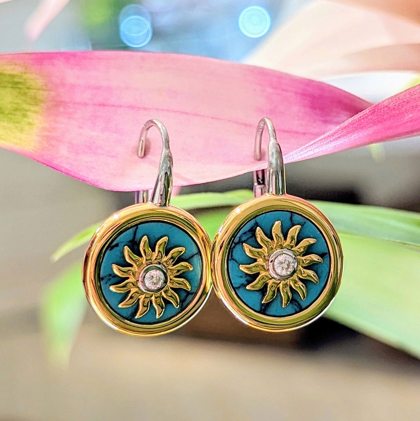 Photo of Gold Plated Sunburst Turquoise Earring in a decorative scene, designed by , available at Plumb Gold & Plumb Silver
