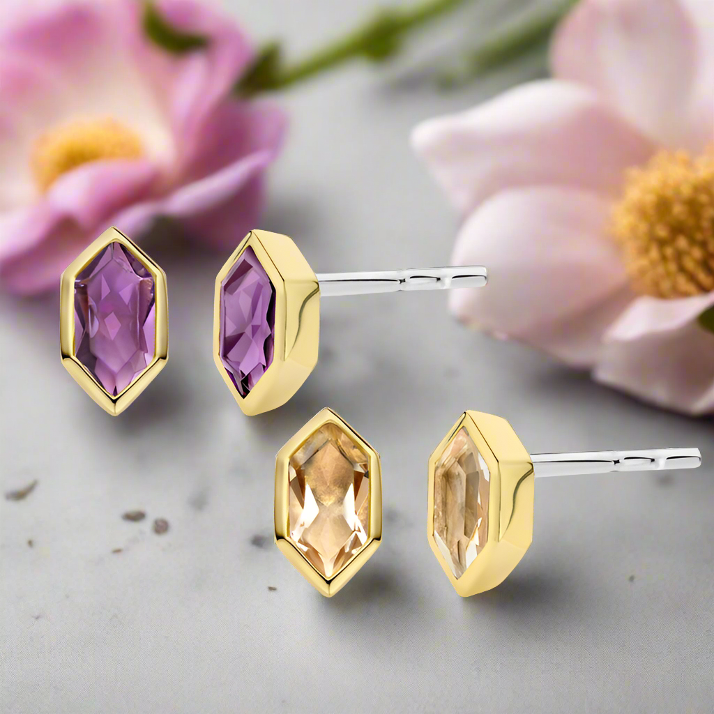 Photo of Hex CZ Studs in a decorative scene, designed by , available at Plumb Gold & Plumb Silver